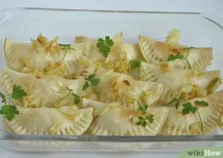 Приготовить вареники из картофеля и сыра Шаг 15 Приготовить вареники из картофеля и сыра Шаг 15