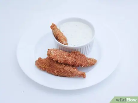 Приготовить куриные пальцы, покрытые киноа, шаг 13