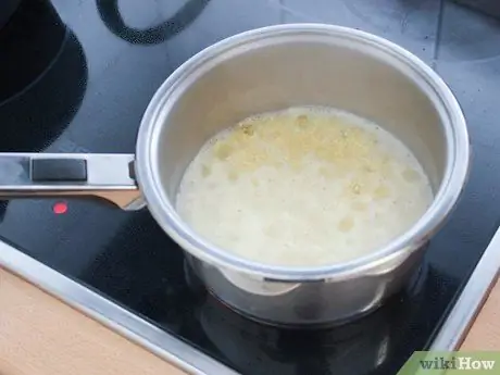 Приготовить куриные пальцы, покрытые киноа, шаг 2