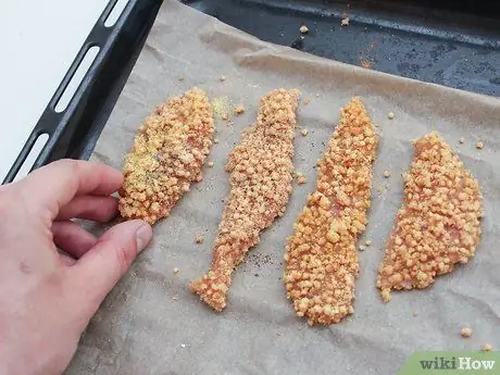 Приготовить куриные пальцы, покрытые киноа, шаг 7