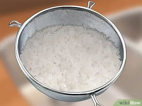 Сохраняйте рис теплым Шаг 12