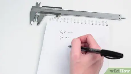 Используйте штангенциркуль Vernier Step 10 Используйте штангенциркуль Vernier Step 10