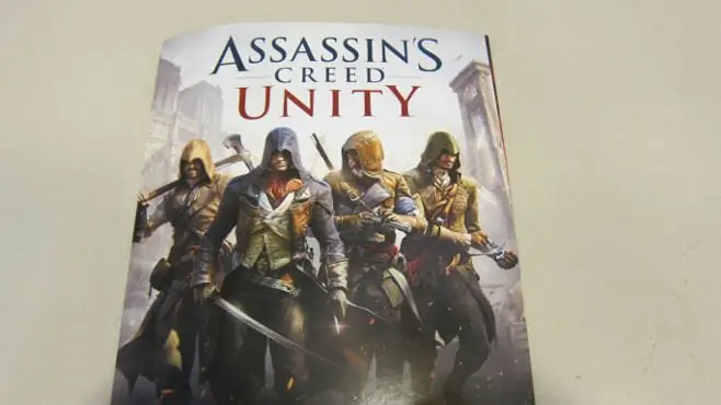 Бонус предзаказа Assassin's Creed Unity и информация о сезонном пропуске найдены в мусорном контейнере
