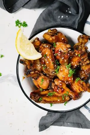 Запеченный апельсиновый цыпленок с кунжутом