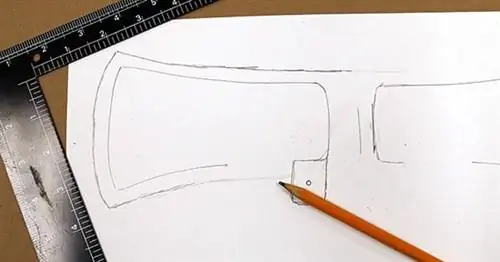 Рисунок топора, нарисованный на бумаге.